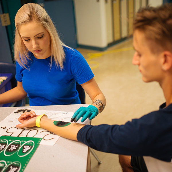 Professional airbrush tattoo service in Toronto for events, festivals, and parties. Unique, temporary tattoos for all ages.