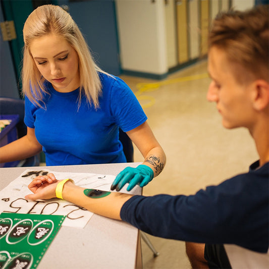 Professional airbrush tattoo service in Toronto for events, festivals, and parties. Unique, temporary tattoos for all ages.