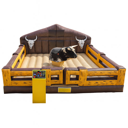 Inflatable mechanical bull riding game with a bull and rider figure, made of commercial grade PVC, requiring a blower for operation.