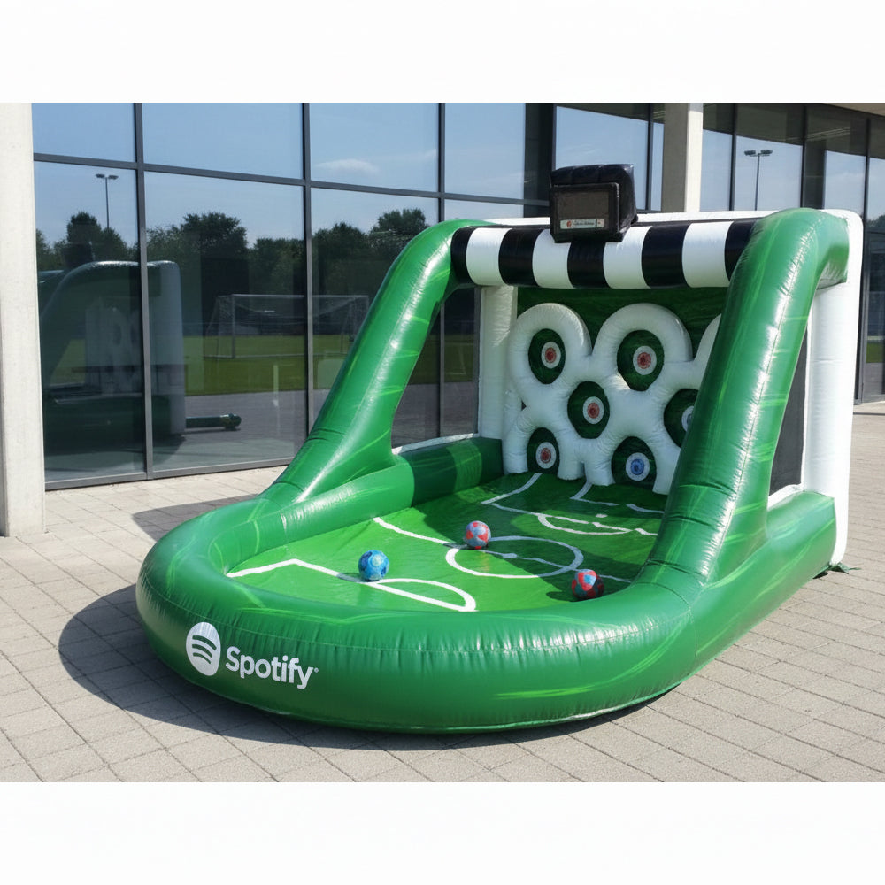 Inflatable soccer goal with Spotify branding on a paved area.