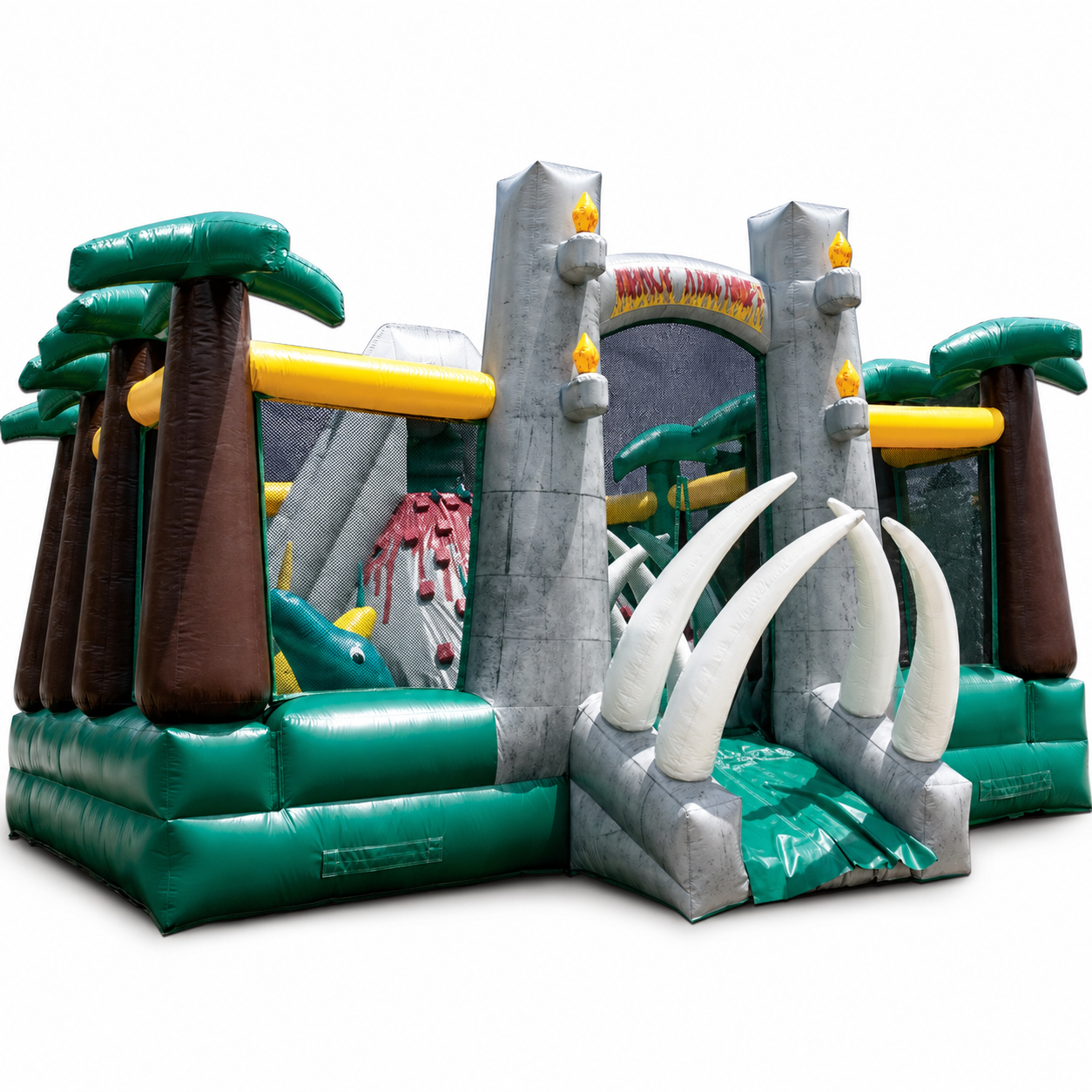 Commercial jungle adventure inflatable obstacle course with palm trees, castle entrance and tusk decorations on a white background
